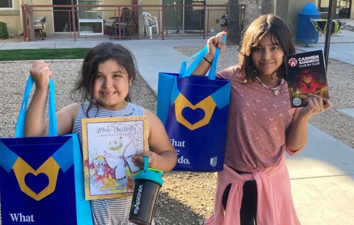 kids with books at event