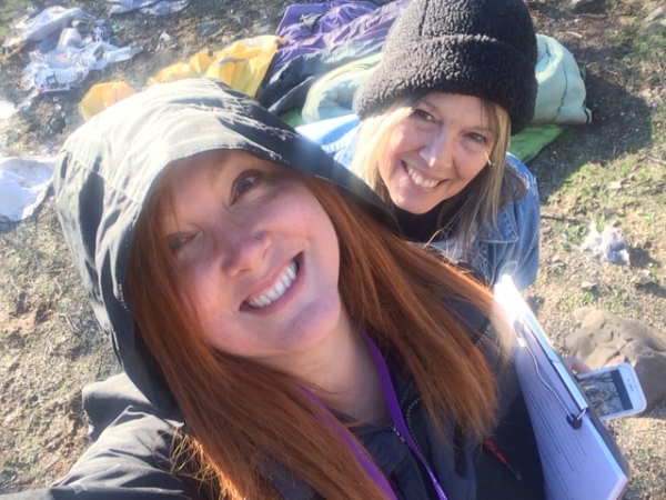 Catholic Charities team members Meredith Earles and Janet Conchy prepare for the annual homeless count.